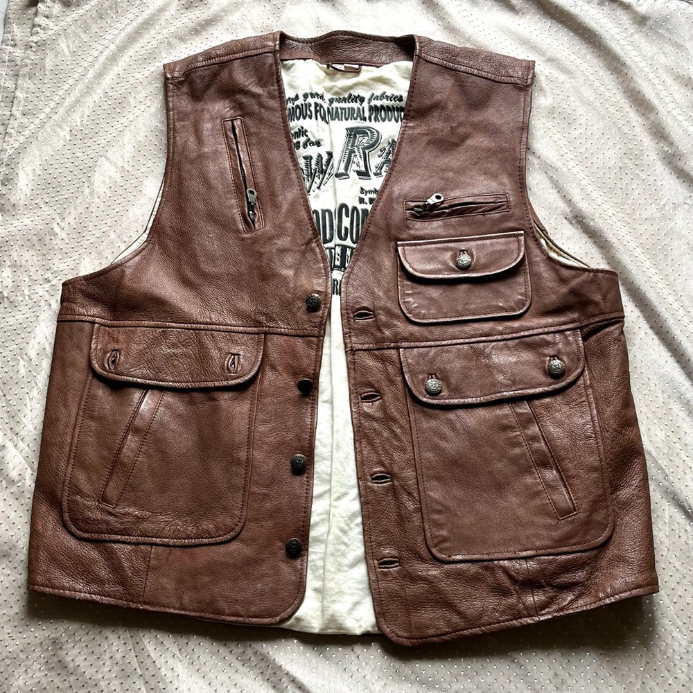 Authentic Leather vest with a cream colored interior from the brand “Raw Rags”